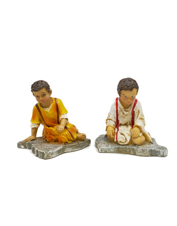 Niños jugando, para el Belén.