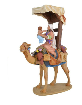Pastora con niño a camello...