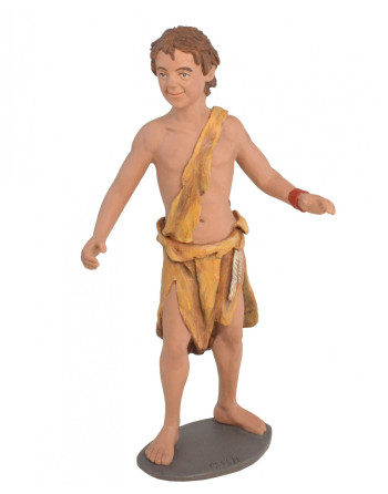 Niño caminando para el Belén