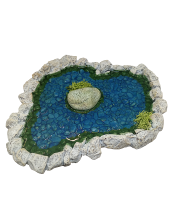Lago pequeño con piedra...