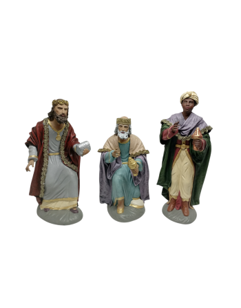 Reyes adorando con manos de...