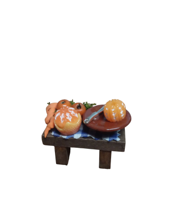 Mesa con naranjas para el...