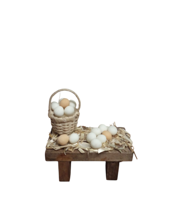 Mesa con huevos para el belén