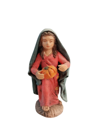 Niña con calabaza para el...