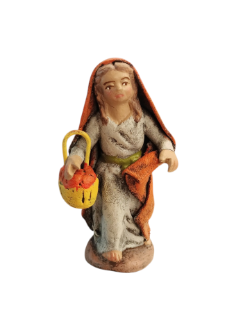 Niña con cesto para el belén