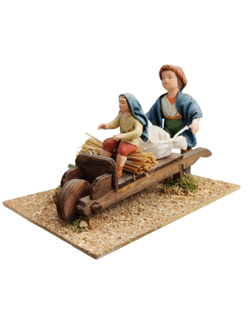 Niños con carreta para el...