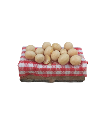 Caja con huevos miniatura...
