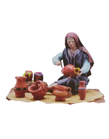 Pastora pintando cerámica...