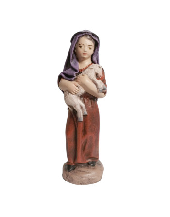 Niño con cordero para el Belén