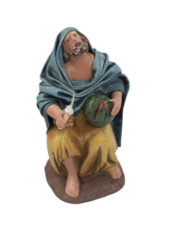 Pastor sentado barro...