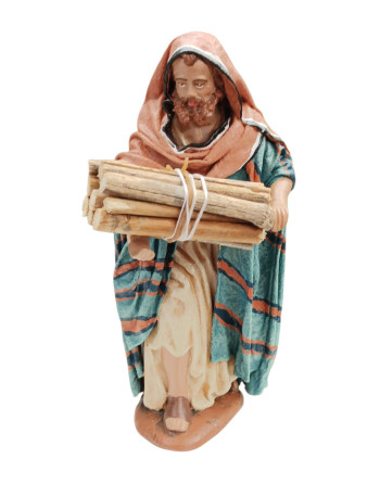 Pastor con leña.