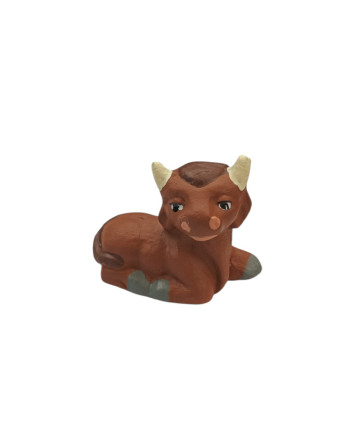 Buey tumbado miniatura para...