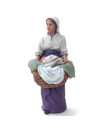Mujer con cesto de ropa Montserrat Ribes. 12 cm. 394.