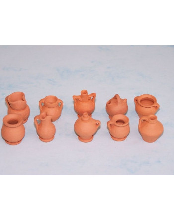 Blister cerámica mini 20 unidades, 10 modelos surtidos de 2,5cm.