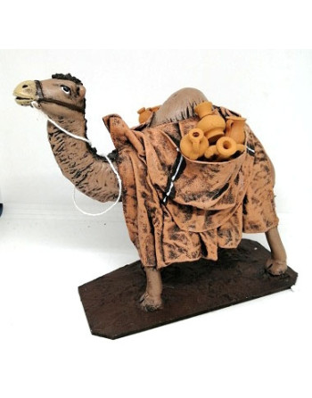 Camello con carga en barro. 14CA